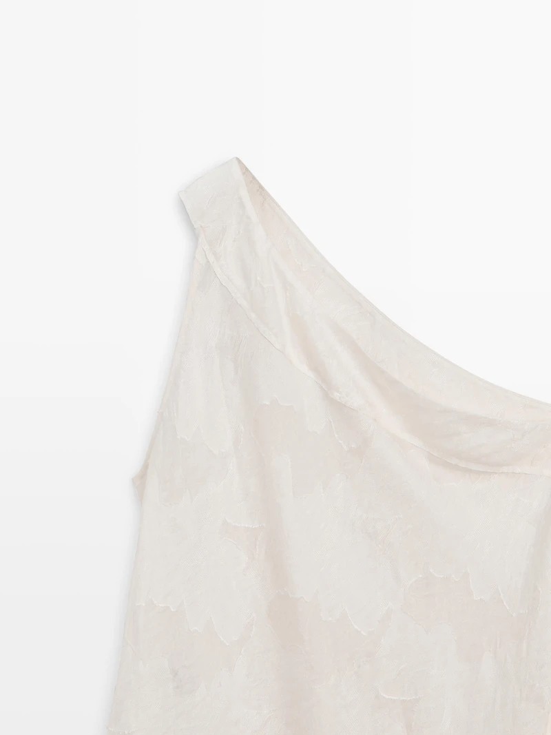 Top with asymmetric neckline