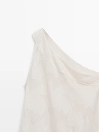 Top with asymmetric neckline