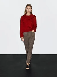 Cable-knit sweater with scarf detail