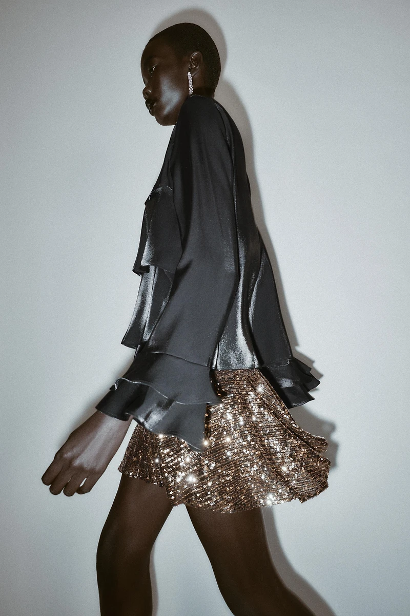 ASYMMETRIC SEQUIN SKORT