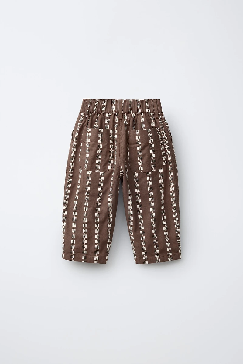 EMBROIDERED PRINTED BAGGY PANTS