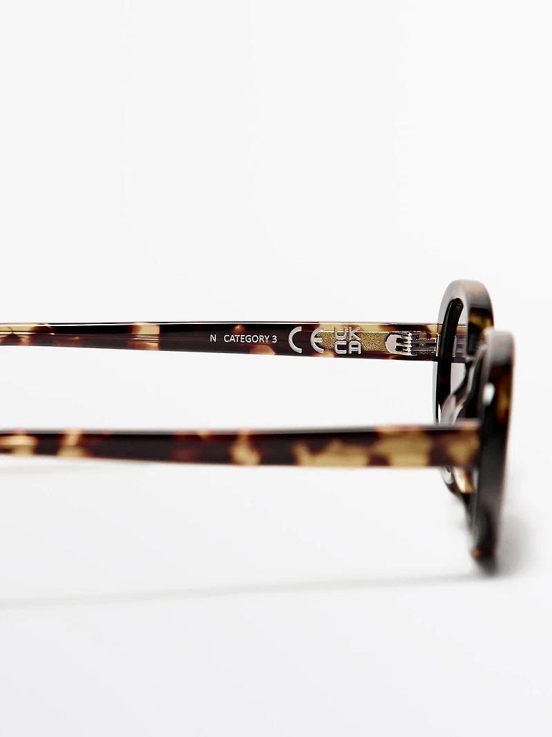Tortoiseshell-effect mini oval sunglasses
