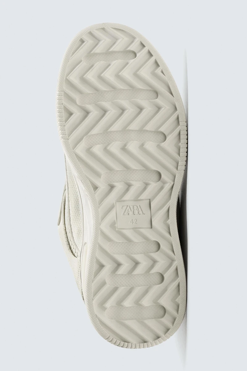 DISTRESSED THICK-SOLED SNEAKERS