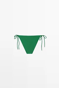 Bas de bikini à nœud brillant