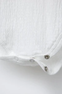 TEXTURED BODYSUIT