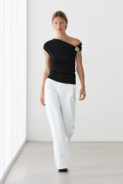 Asymmetric top with rhinestone detail