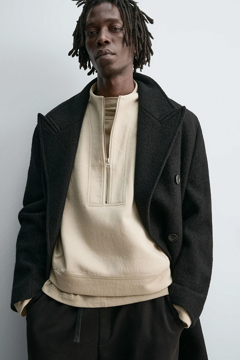 CROPPED FIT NEOPRENE EFFECT SWEATSHIRT WITH STUDS
