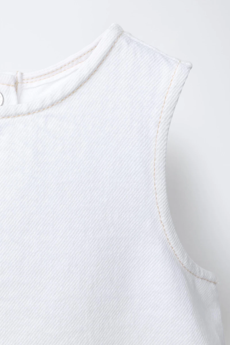 TOP EN DENIM À VOLANTS