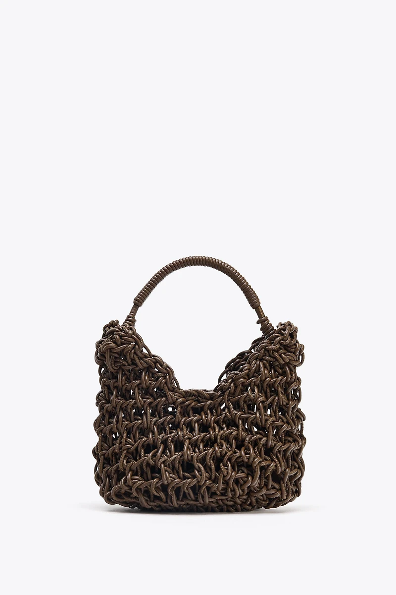 SAC À MAIN TRESSÉ SURPIQÛRES