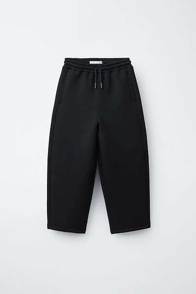 NEOPRENE EFFECT STRAIGHT FIT PANTS