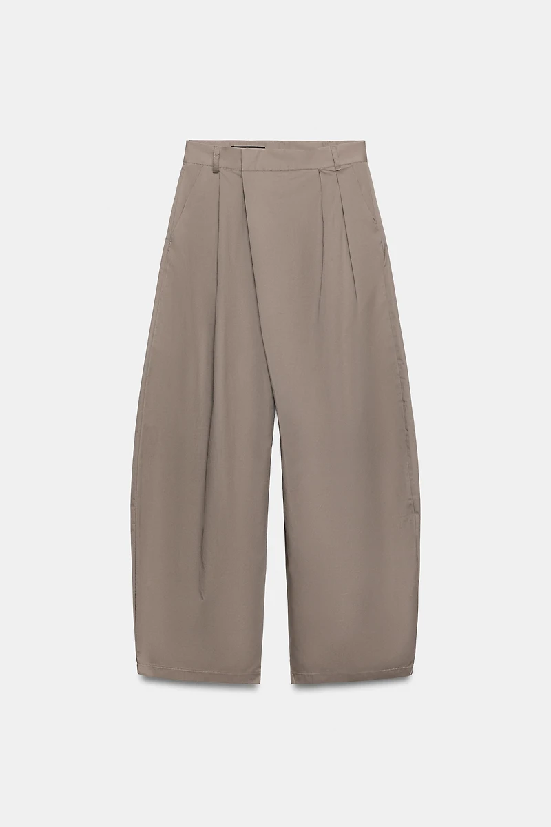 ASYMMETRIC WAIST PLEATED TROUSERS