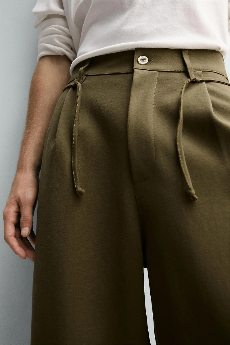 PLEATED DRAWSTRING PANTS