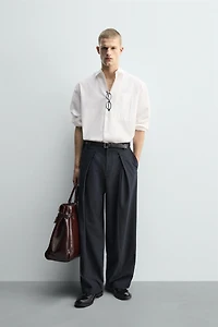PLEATED PINSTRIPE PANTS