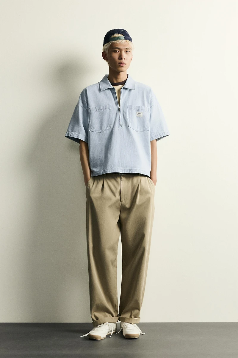 CHEMISE POLO À ZIP ET POCHES