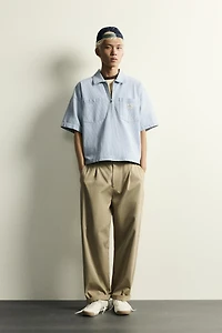 CHEMISE POLO À ZIP ET POCHES