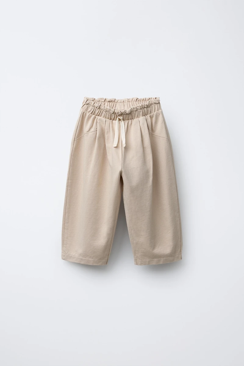 PANTALON BAGGY DÉTAIL CROCHET