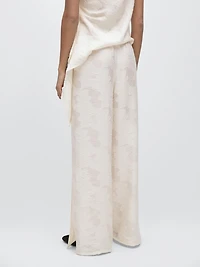 Pantalon élastique fluide détail tissu