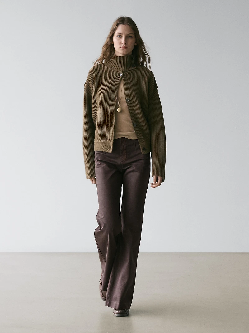 Waxed flare fit trousers