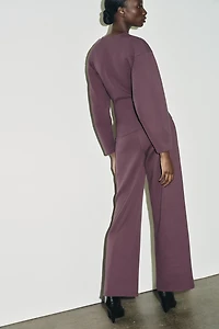 INTERLOCK JUMPER WITH DARTS