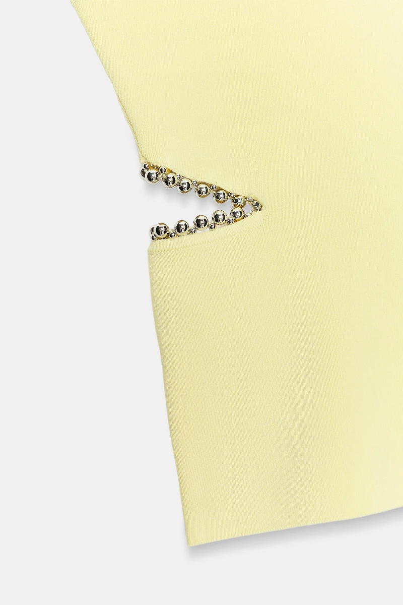 CUT OUT KNIT TOP WITH BEADS