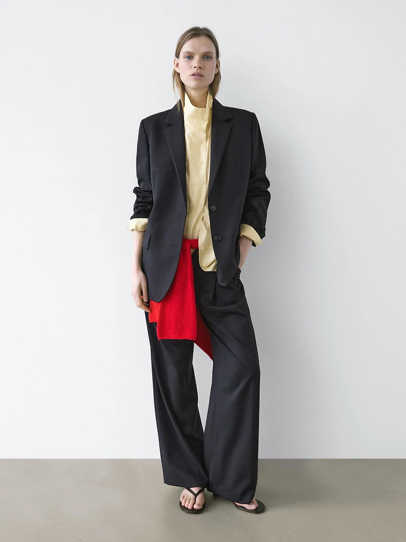 Pleated extra fine wool trousers