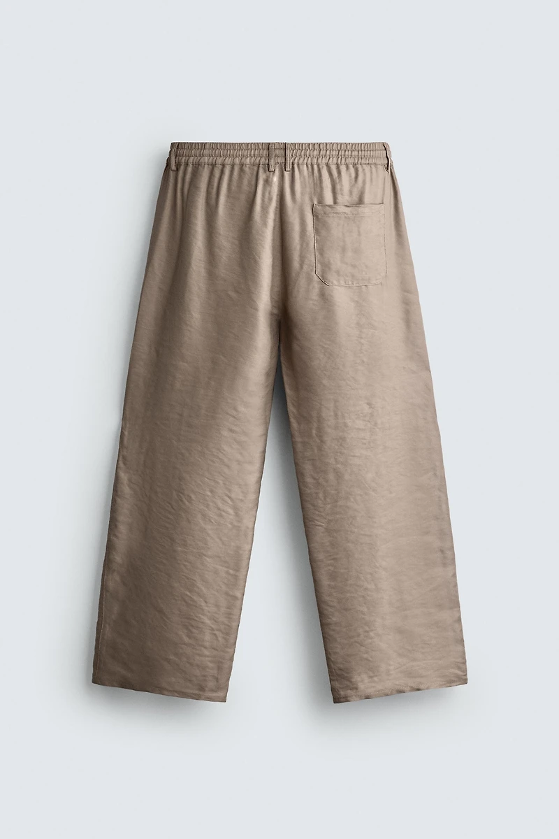 RELAXED FIT FLOWY PANTS