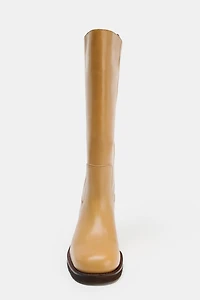BOTTES EN CUIR AVEC SURPIQÛRES
