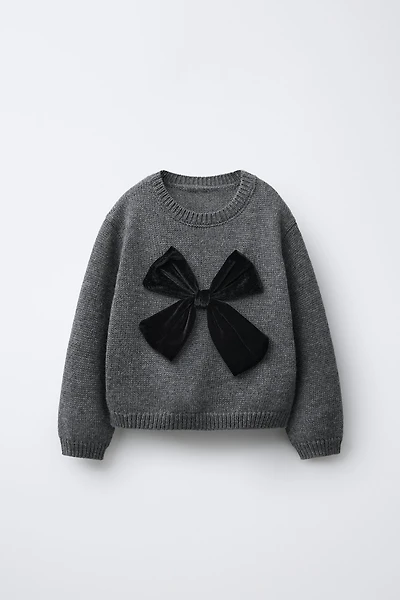 PULL EN MAILLE AVEC NŒUD VELOURS
