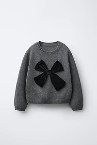PULL EN MAILLE AVEC NŒUD VELOURS