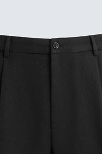 PANTALON COUPE DÉCONTRACTÉE À PLIS