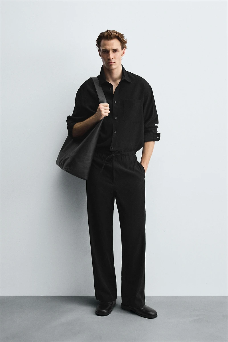 RELAXED FIT FLOWY PANTS