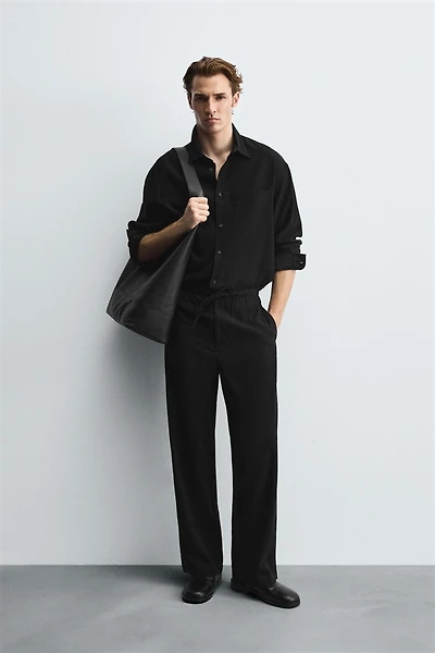 RELAXED FIT FLOWY PANTS