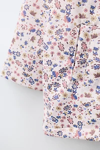 WATER-RESISTANT FLORAL RUBBERIZED RAINCOAT