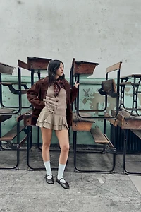 GILET EN MAILLE FINITIONS CÔTELÉES