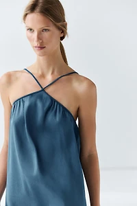 Long flowing dress with criss-cross straps
