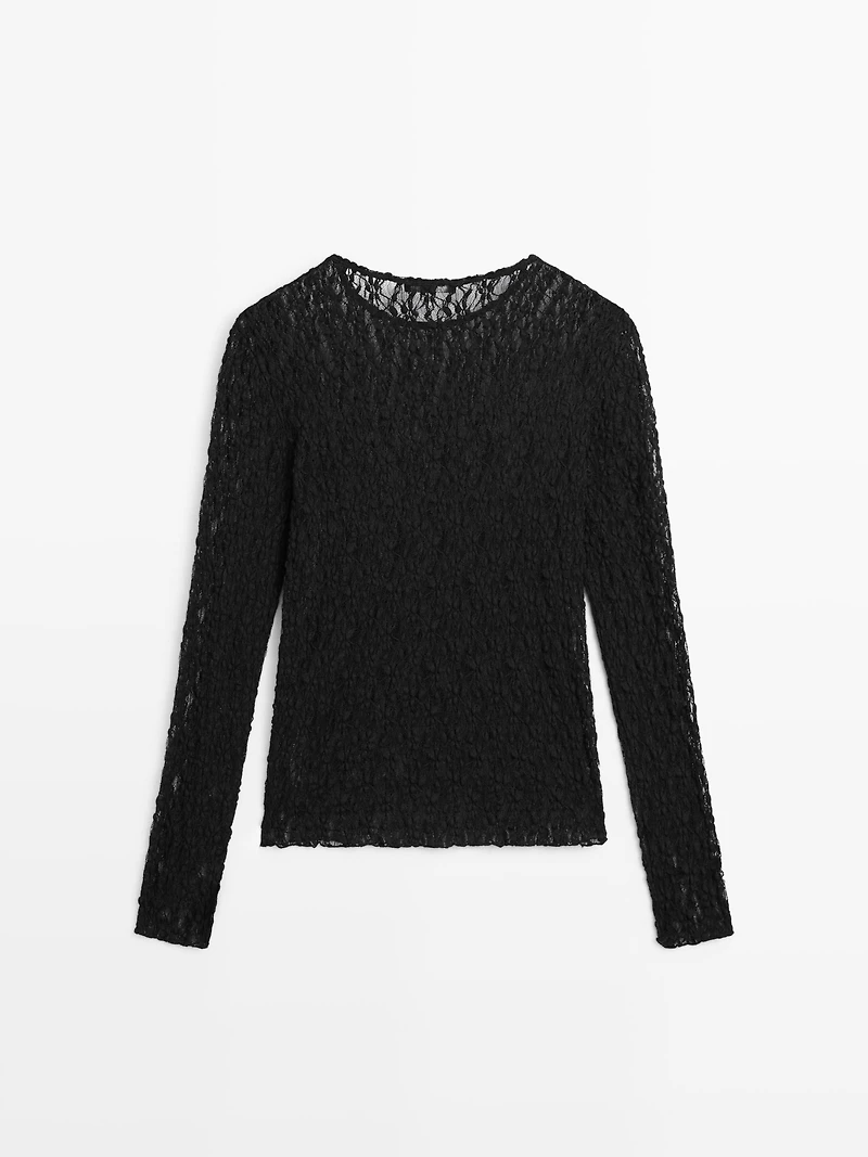 Top en maille de dentelle ajourée à manches longues