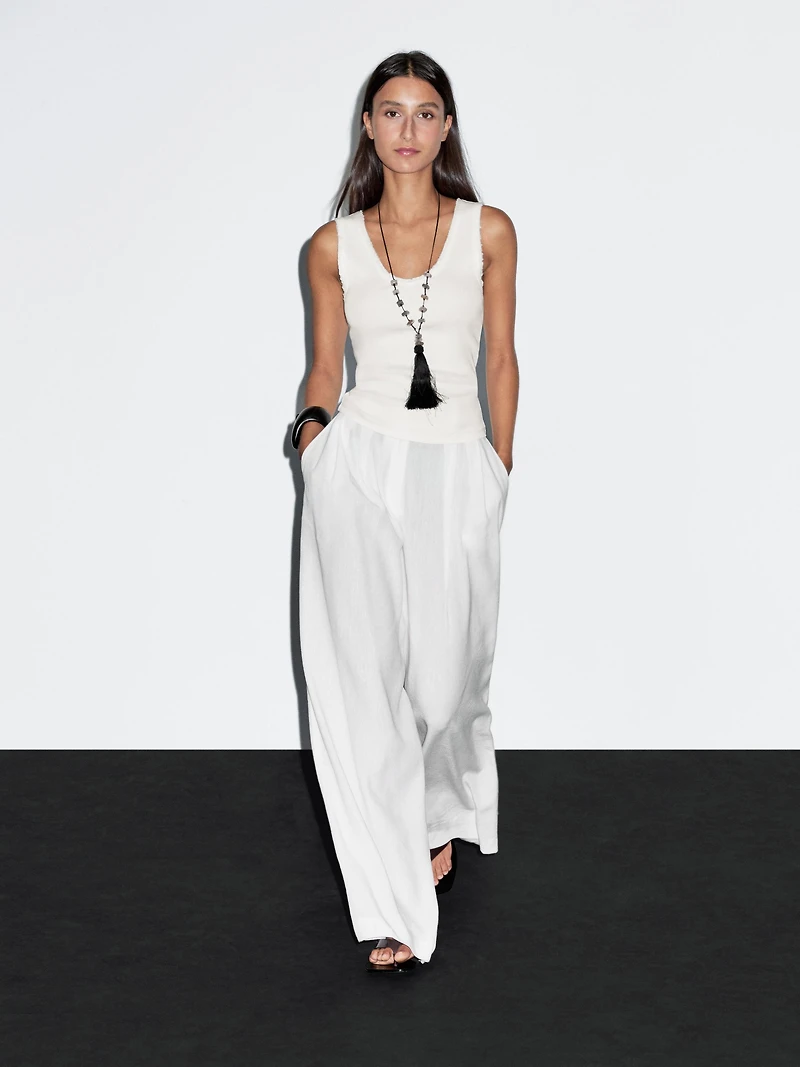 Top avec liseré effiloché en coton mélangé