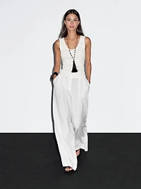 Top avec liseré effiloché en coton mélangé