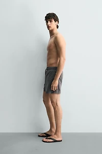 METALLIC EYELET SWIMSUIT