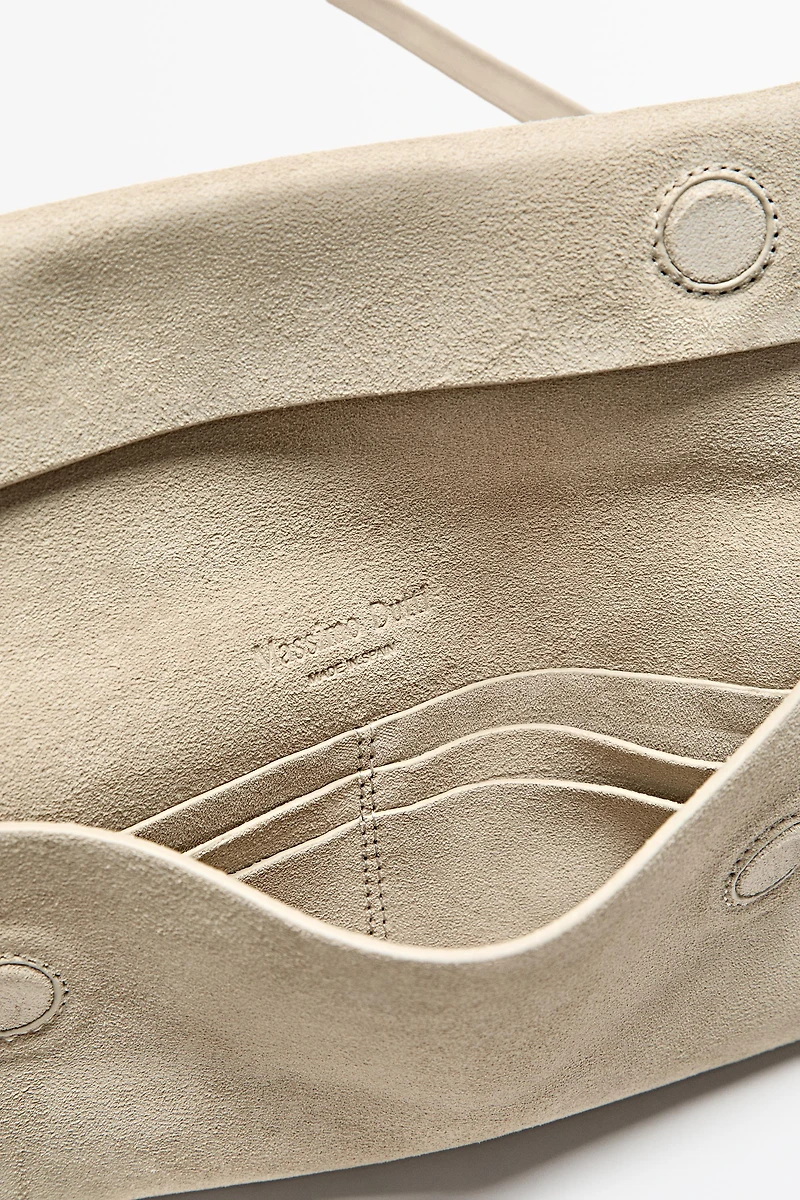 Sac bandoulière en cuir et daim