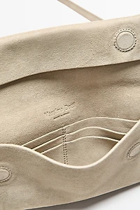 Sac bandoulière en cuir et daim