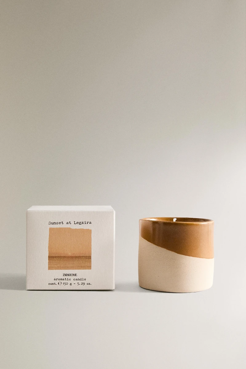 (150 G) SUNSET AT LEGZIRA SCENTED CANDLE