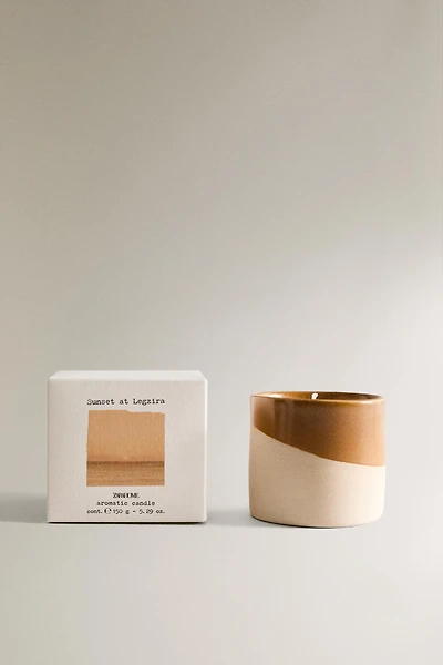 (150 G) SUNSET AT LEGZIRA SCENTED CANDLE