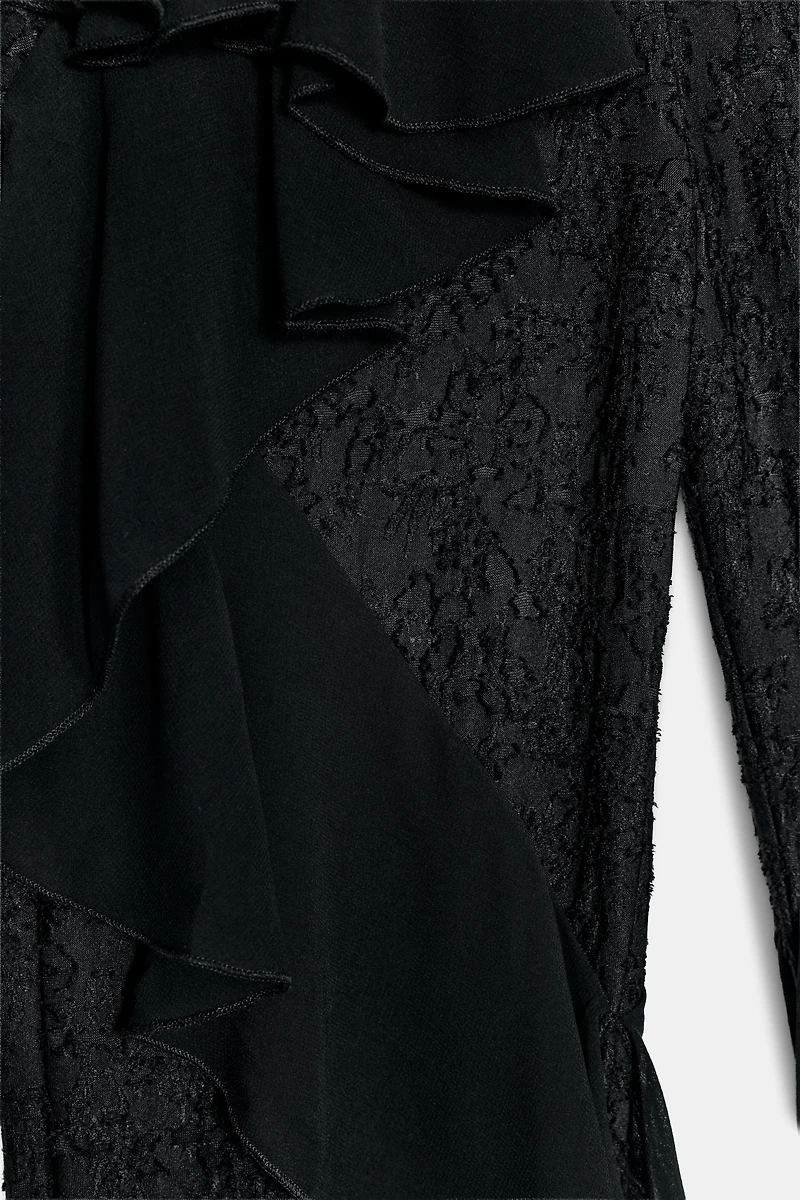 PANTALON EN DENTELLE À VOLANTS