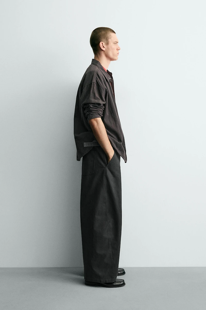 RELAXED FIT PANTS WITH TWISTED SEAM