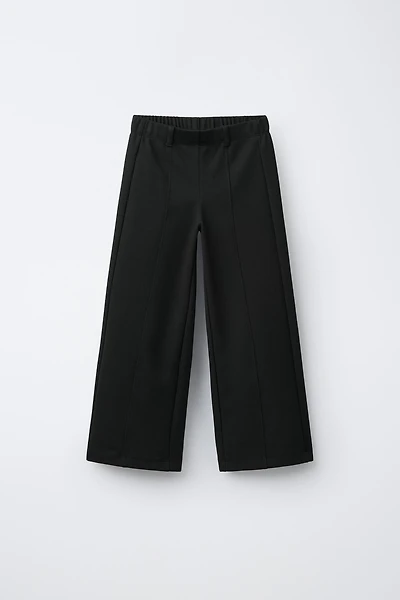 PANTALON EN MAILLE POINT ROMA À JAMBES LARGES