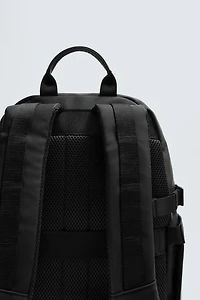SAC À DOS EFFET GOMME MULTI-POCHES