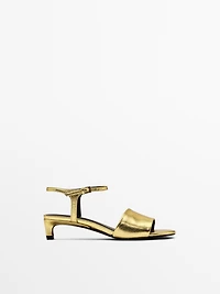 Golden slide sandals