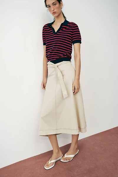 CONTRAST STITCH BELTED SKIRT