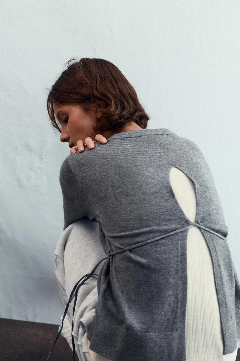 KNIT SWEATER WITH LACE-UP OPEN BACK